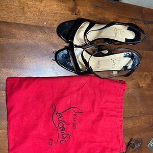Christian louboutin black and red very classy shoe only been worn once.
